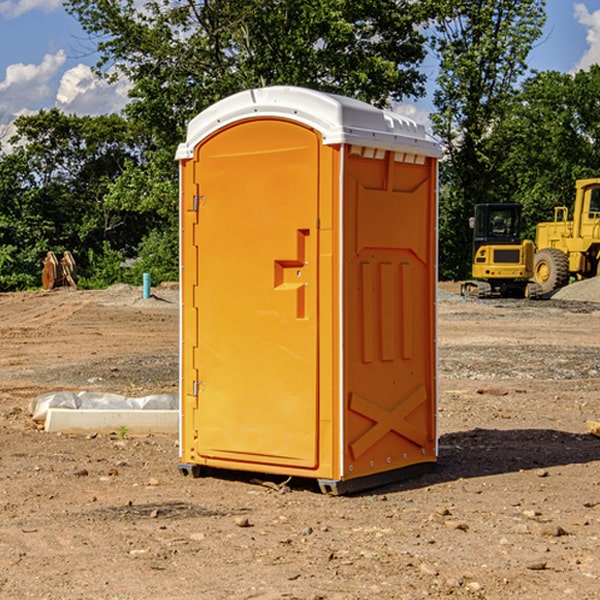 how often are the portable restrooms cleaned and serviced during a rental period in Doran